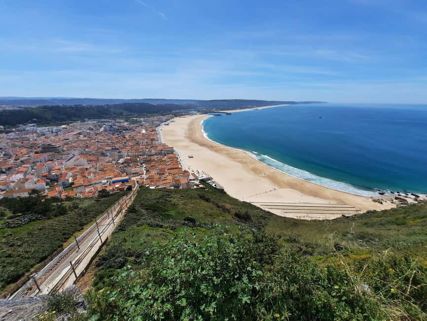 Small Group Excursion to Nazaré, Alcobaça and Obidos from Lisbon - Óbidos: medieval streets, cobbled charm, and Ginja tasting