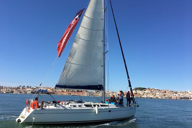 Small-Group Sailing Tour on the Tagus River from Lisbon - Guide style and onboard extras: fun, but not always textbook