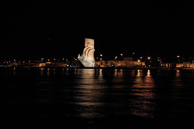 Sunset and Night Cruise with Champagne - Back toward Lisbon: squares, castles, and night life glow