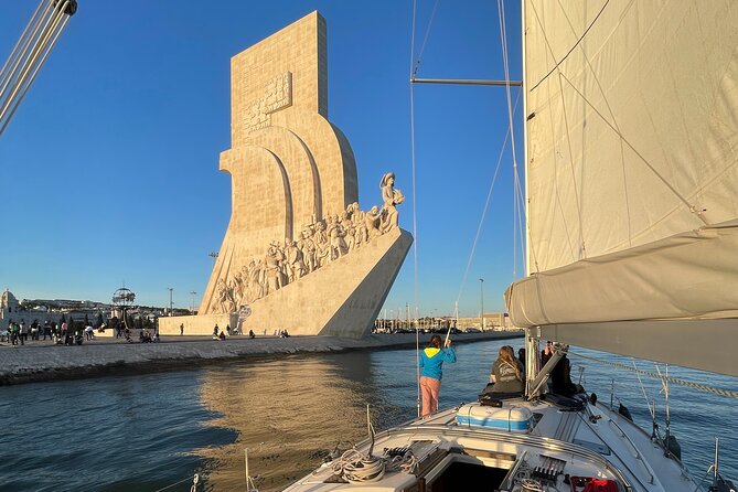 Sunset Boat Tour in Lisbon with Wine - Lisbon bridges and classic squares: the 25 de Abril moment