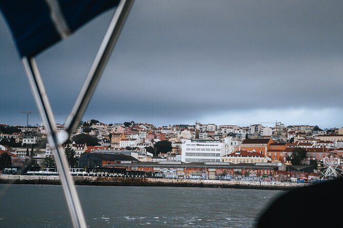 Sunset Sailboat Tejo River Tour 2h - Sailing under Lisbon’s iconic landmark: the photo moment people remember
