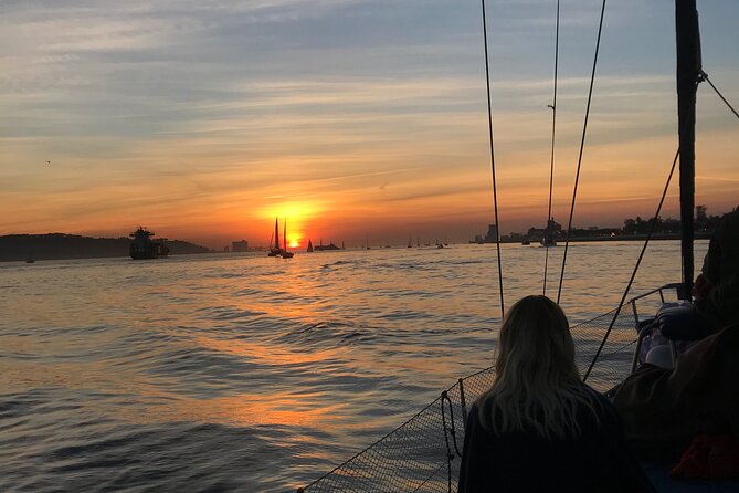 Sunset sailboat tour in Lisbon with green wine - The cruise setup: comfort, blankets, and calm pacing