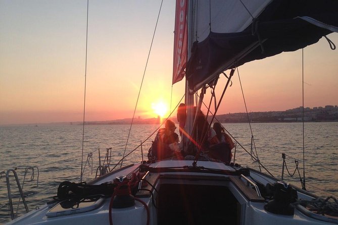 Sunset Sailing Tour On The Tagus River - Cold wind reality check, plus how to dress like a pro