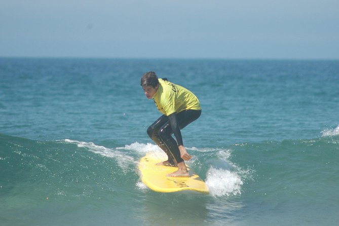 Surf Lesson in Costa da Caparica - Learning on sand first: standing and paddling without the chaos
