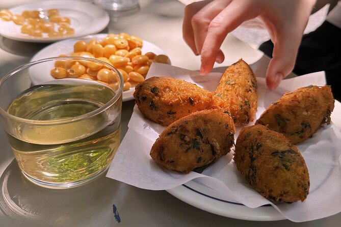 The Portuguese Food Tour – Dishes, Drinks & Sights - Getting started at Praça Luís de Camões (and why timing matters)