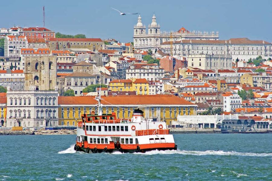 Total Lisbon Experience Walking Tour with Seafood Lunch - Rossio cobblestones to Baixa, then Chiado viewpoints with a beer