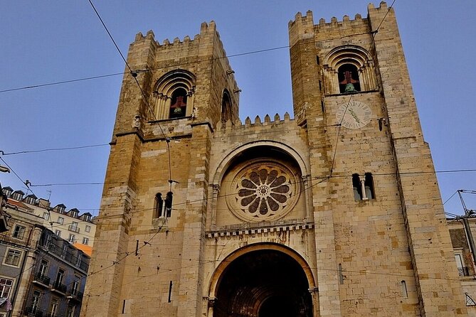 Tuk tuk experience through the historic neighborhood of Alfama - Lisbon Cathedral: Mixed Styles, Real Interior Time (Free)
