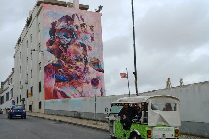 Tuk Tuk Lisbon: Exploring Urban Art - Stop 4: Graça district art that honors Portuguese literature and adds big viewpoint energy