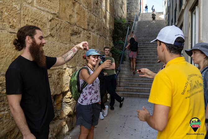 Walk Lisbon Like a Local: Bairro Alto & Downtown Experience - Starting at Praça Dom Pedro IV, then letting Rossio pull you in